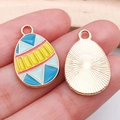 Enameled Easter egg charms in geometric patterns with a textured metal back - Two-Tone Chick Egg (15140) / 1 Piece/Pack (14x22mm) / Blue-Yellow