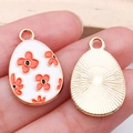 Easter egg charms in white enamel with orange flower patterns for DIY jewelry making - Flower Pattern Egg (15141) / 1 Piece/Pack (14x22mm) / White Red