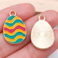 Colorful Easter egg enamel pendant charms for DIY bracelets shown in palm - Wavy Pattern Egg (15146) / 1 Piece/Pack (14x22mm) / Green Yellow