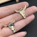 Golden and colorful enamel bull skull charms for DIY jewelry and earrings - Green Enamel Leaf Bull Skull (19490)