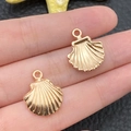 Pair of golden scallop shell charms in KC gold alloy for DIY jewelry bracelet making - KC Gold Marine Shell Style (18281)
