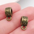 Cuentas espaciadoras de bronce antiguo con grabados y lazo para creación de joyas DIY - Enganche Triple Bronce Antiguo (20664)