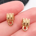 Enganche estriado de oro rosa con anilla para crear joyas DIY sobre un dedo - Enganche Triple Oro KC (20661)