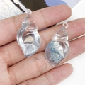 DIY transparent resin ocean charms with natural shells and blue glitter in hand - Blue Conch Style (18954)
