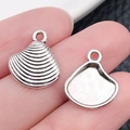 Colgante concha plata antigua para bisutería DIY con texturas nervadas realistas - Concha Océano Plata Antigua (10372)