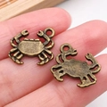 Set de dos colgantes de cangrejo en bronce vintage para joyería DIY y collares del océano - Cangrejo Océano Bronce Antiguo (20713)