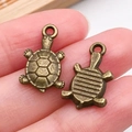 Pareja de dijes de tortuga en bronce vintage para la creación de joyas DIY - Tortuga Océano Bronce Antiguo (20714)