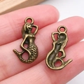 Dijes de sirena en bronce antiguo para joyería artesanal, juego de dos piezas - Sirena Océano Bronce Antiguo (20718)