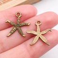 Colgantes de estrella de mar en bronce para joyas con texturas de frente y dorso - Estrella de Mar Océano Bronce Antiguo (20720)