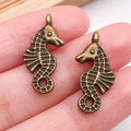 Par de colgantes de caballito de mar en bronce antiguo para joyería DIY en la punta del dedo - Caballito de Mar Océano Bronce Antiguo (20724)