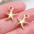 Colgantes de estrella de mar dorada en aleación para joyas DIY con textura y anilla - Estrella de Mar de Océano de Oro KC (11606)