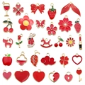 DIY jewelry set featuring 24 red enamel zinc alloy charms with golden metal edges - Red Enamel Set (HK551)