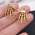 Colgantes de mano de esqueleto en oro antiguo para joyas DIY, set de dos dijes de aleación - Estilo de Mano de Esqueleto (20089) / 1 Pieza/Paquete (17x21mm) / Oro antiguo