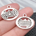 Colgante óvalo nota musical plata antigua con clave de sol para joyería artesanal - Nota Musical Redonda (18935)