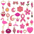DIY jewelry making kit featuring 27 pink enamel cartoon pendants in gold plating - Enamel Rose Red Set (HK554)
