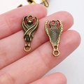 Set de dos colgantes de murciélago de bronce con bucles dobles para joyería DIY - Estilo de Murciélago (20102) / 1 Pieza (10x20.5mm) / Bronce Antiguo