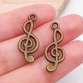 Colgantes de clave de sol en bronce vintage para creación de joyas y manualidades - Clave de Sol (1107)