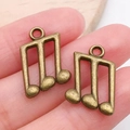 Colgantes de notas musicales en bronce antiguo de aleación de zinc para joyería artesanal - Tresillo (20895)