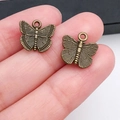 Par de colgantes de mariposa en aleación de bronce antiguo para joyería artesanal - Estilo Mariposa Bronce Antiguo (20154) / 12x12mm