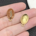 Golden coffee bean enamel pendant charm with textured back for DIY jewelry and necklaces - Coffee Brown Enamel Bean (21150)