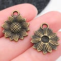 Vintage bronzen zonnebloem hanger van legering voor DIY-sieraden en sleutelhangers - Antique Bronze Sunflower (18x15mm)