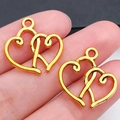 Gouden holle in elkaar grijpende dubbele hartbedeltjes voor doe-het-zelf sieraden - Antiek Gouden Dubbel Hart (19994)