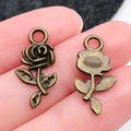 Vintage roos bloem hanger van legering in antiek brons met reliëfstructuren - Antique Bronze Rose (21x10mm)