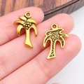 Gouden palmboom hangers van legering met gedetailleerde voor- en achterkant - Antiek Gouden Kokosboom (19875)