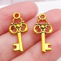 Colgantes vintage huecos de aleación de oro mate con forma de llave para joyería DIY - Llave de Oro Antiguo (11117)