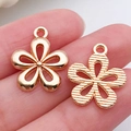 Roségouden bloembedels in gepolijste en gestreepte afwerking voor sieraden maken - KC Gold Hollow Flower (18x15mm)