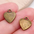 Paar antieke bronzen hartvormige bedeltjes voor het maken van DIY sieraden en kettingen - Antiek Brons Hart (19945)