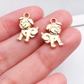 Goldene Hundeanhänger aus Metalllegierung mit Reliefstruktur und Aufhängöse - KC-Gold Lächelnder Hund (20521)