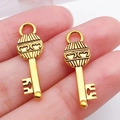 Colgante de llave dorada vintage con grabados para creación de joyería de DIY - Llave de Oro Antiguo (20950)