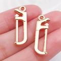 Colgante mini sierra de mano dorado para creación de joyas DIY y accesorios - Sierra de Oro KC (18334)