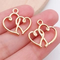 Gouden legering in elkaar grijpende dubbele hart hangers voor DIY sieraden maken - KC Gouden Dubbel Hart (18259)