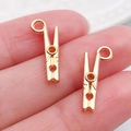 Colgantes creativos de aleación bañada en oro de 18K con forma de pinza para bisutería - Clip de Oro KC (20253)