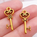Colgantes de llave de corazón vintage en oro brillante para creación de joyas DIY - Llave de Oro Antiguo (20956)