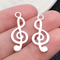Par de colgantes de clave de sol en plata pulida para la creación de joyas - Clave de Sol (20922)