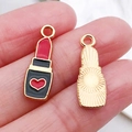 Lipstick shaped gold alloy charm with black and red drip oil finish and heart detail - Lipstick (12477) / Black