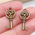 Colgante de llave vintage en aleación de bronce con forma de corazón para joyería DIY - Llave Bronce Antiguo (20987)