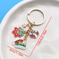 Christmas themed gold metal keychain with colorful enamel snowman and Santa hat pendants - Snowman Hat Snowflake Gift Style (ER823)