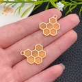 Colgante de panal naranja translúcido con marco dorado para creación de joyas - Panal de Esmalte Naranja (13955)