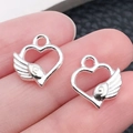 Zilveren opengewerkte hartvormige hanger met vleugel voor DIY-sieraden maken - Glanzend Zilveren Hart Vleugels (19961)