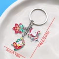 Christmas Santa and Snowman enamel keychain pendant with gold finish, 3.07 inches long - Christmas Lights Skier Santa Reindeer Style (ER830)