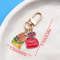 Christmas reindeer and gift box enamel keychain in gold finish, height 5.7cm - Christmas Gifting Reindeer Bag U-Shape Keychain (ER832)