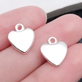 Paar kleine zilveren hartvormige holle hangers voor DIY sieraden maken - Glanzend Zilveren Hart (19967)