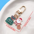 Cartoon Santa Claus and gift bag metal keychain in gold finish with measurements - Santa Gift Bag U-Shape Keychain (ER834)