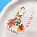 Cute Christmas gingerbread man and red sock keychain charms in gold-tone alloy finish - Christmas Gingerbread Man Sock U-Shape Keychain (ER836)
