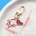 Christmas keychain with enamel Santa Claus and red boot charm in golden finish - Christmas Skater Santa Skates U-Shape Keychain (ER837)