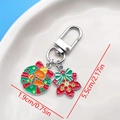 Silver Christmas keychain featuring wreath gingerbread man and snowflake charms - Christmas Wreath Gingerbread Man Snowflake U-Shape Keychain (ER839)